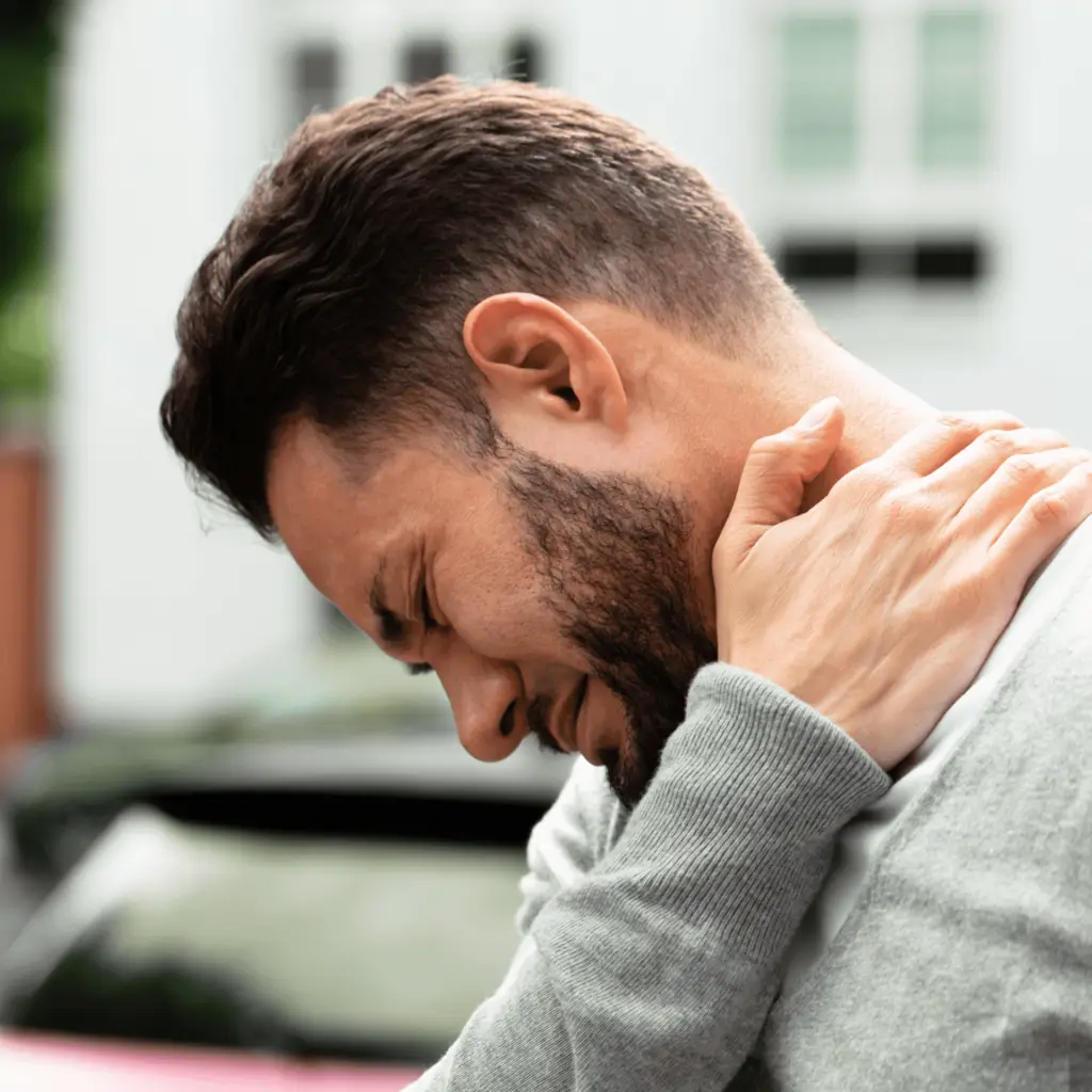 person performing gentle neck stretches to ease tension and discomfort